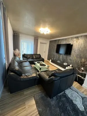Ein Sitzbereich in der Unterkunft Ferienwohnung Schwanenstadt