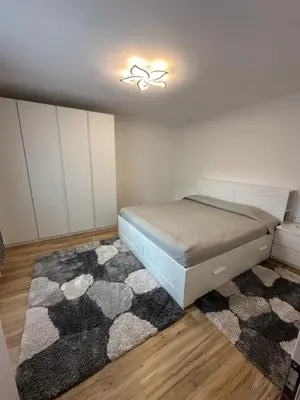 Ein Bett oder Betten in einem Zimmer der Unterkunft Ferienwohnung Schwanenstadt