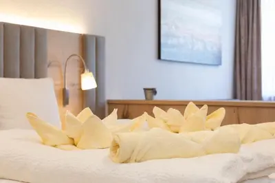 Ein Bett oder Betten in einem Zimmer der Unterkunft Appartement Krippenstein mit Indoorpool und Sauna