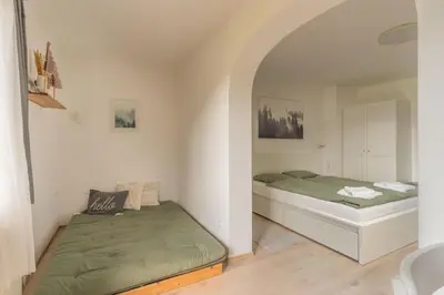 Ein Bett oder Betten in einem Zimmer der Unterkunft LOBE Apartment