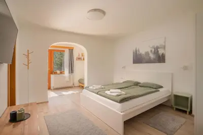 Ein Bett oder Betten in einem Zimmer der Unterkunft LOBE Apartment