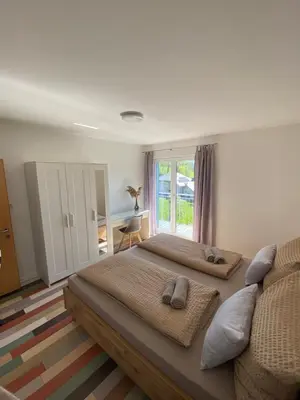 Ein Bett oder Betten in einem Zimmer der Unterkunft Ferienwohnung Lara