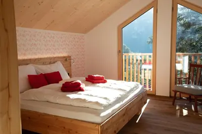 Ein Bett oder Betten in einem Zimmer der Unterkunft Feldhasen