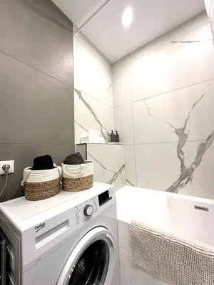 Ein Badezimmer in der Unterkunft Royal Retreat - ŠARAC Apartment
