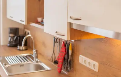 Küche/Küchenzeile in der Unterkunft Ferienwohnung-Walserhaus