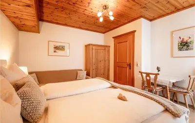 Ein Bett oder Betten in einem Zimmer der Unterkunft Ferienwohnung Im Walserhaus