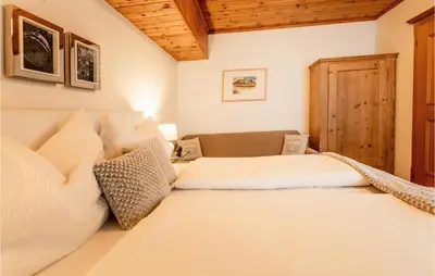 Ein Bett oder Betten in einem Zimmer der Unterkunft Ferienwohnung Im Walserhaus