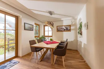 Ein Sitzbereich in der Unterkunft Hauskitz