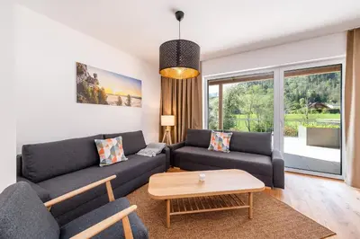 Ein Sitzbereich in der Unterkunft Mountain Apartments - by myNests