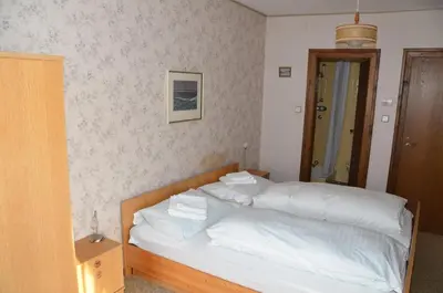 Ein Bett oder Betten in einem Zimmer der Unterkunft Haus Grader