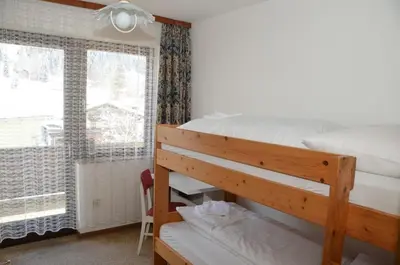 Ein Bett oder Betten in einem Zimmer der Unterkunft Haus Grader