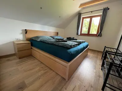 Ein Bett oder Betten in einem Zimmer der Unterkunft Reiterbauer Chalet