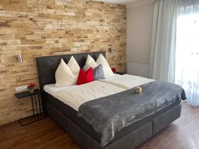 Ein Bett oder Betten in einem Zimmer der Unterkunft Appartement Mühlbacher