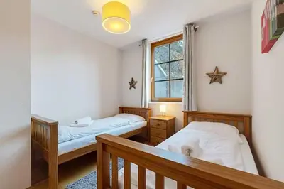 Ein Bett oder Betten in einem Zimmer der Unterkunft Steinadler Seekarspitz FL - Skiing Holiday in Obertauern