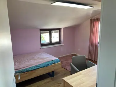 Ein Bett oder Betten in einem Zimmer der Unterkunft Ferienwohnung Nahe Gmunden Top 3