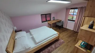 Ein Bett oder Betten in einem Zimmer der Unterkunft Ferienwohnung Nahe Gmunden Top 3