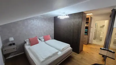 Ein Bett oder Betten in einem Zimmer der Unterkunft Ferienwohnung Nahe Gmunden Top 3