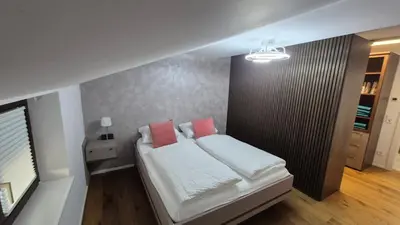 Ein Bett oder Betten in einem Zimmer der Unterkunft Ferienwohnung Nahe Gmunden Top 3