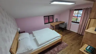 Ein Bett oder Betten in einem Zimmer der Unterkunft Ferienwohnung Nahe Gmunden Top 3