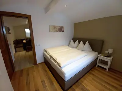 Ein Bett oder Betten in einem Zimmer der Unterkunft Ferienwohnung Marlene