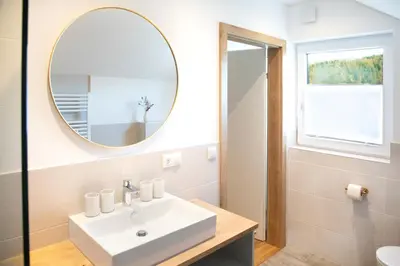 Ein Badezimmer in der Unterkunft Moosaik Appartements