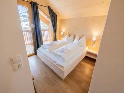 Ein Bett oder Betten in einem Zimmer der Unterkunft Kreischberg W21
