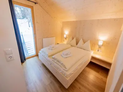 Ein Bett oder Betten in einem Zimmer der Unterkunft Kreischberg W21