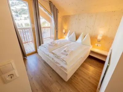 Ein Bett oder Betten in einem Zimmer der Unterkunft Kreischberg W20