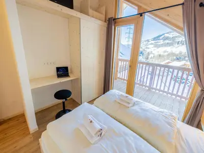 Ein Bett oder Betten in einem Zimmer der Unterkunft Kreischberg W19