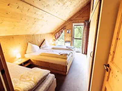 Ein Bett oder Betten in einem Zimmer der Unterkunft Kreischberg W7