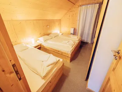 Ein Bett oder Betten in einem Zimmer der Unterkunft Kreischberg W5