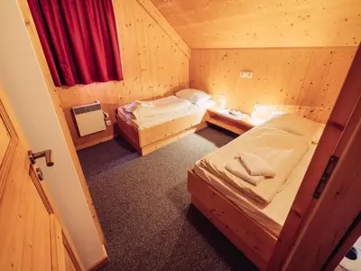 Ein Bett oder Betten in einem Zimmer der Unterkunft Kreischberg W1