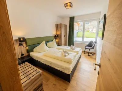 Ein Bett oder Betten in einem Zimmer der Unterkunft Kreischberg The Exclusive 7