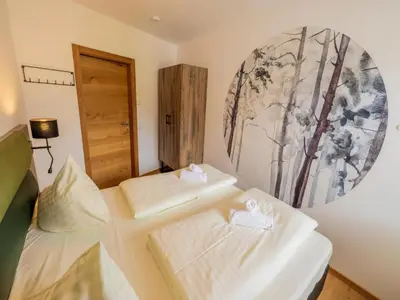 Ein Bett oder Betten in einem Zimmer der Unterkunft Kreischberg The Exclusive 7