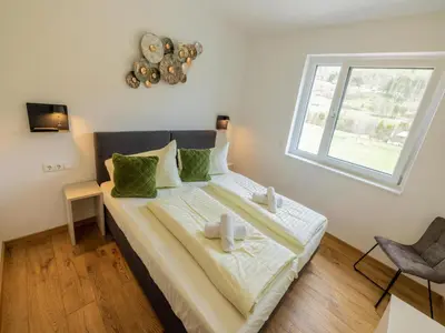 Ein Bett oder Betten in einem Zimmer der Unterkunft Kreischberg The Exclusive 6