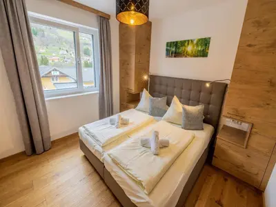 Ein Bett oder Betten in einem Zimmer der Unterkunft Kreischberg The Exclusive 5