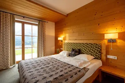 Ein Bett oder Betten in einem Zimmer der Unterkunft Chalet Bergmueller