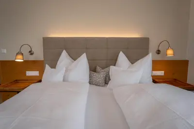 Ein Bett oder Betten in einem Zimmer der Unterkunft Der Zirbenhof