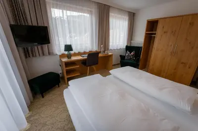 Ein Bett oder Betten in einem Zimmer der Unterkunft Der Zirbenhof