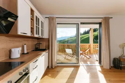 Küche/Küchenzeile in der Unterkunft Seepanorama Apartments am Grundlsee - Your Austrian Home