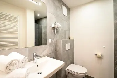 Ein Badezimmer in der Unterkunft Club House by Schladming-Appartements