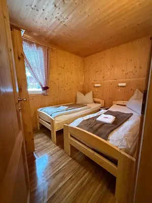 Ein Bett oder Betten in einem Zimmer der Unterkunft Ferienhaus Messner