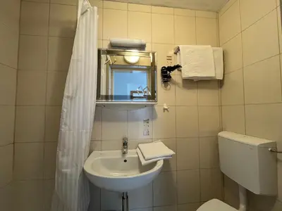 Ein Badezimmer in der Unterkunft Gästehaus Jedinger