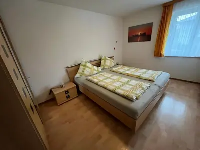 Ein Bett oder Betten in einem Zimmer der Unterkunft Gästehaus Jedinger