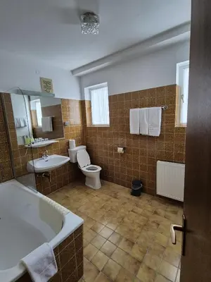 Ein Badezimmer in der Unterkunft Gästehaus Zum Steirischen Kuss