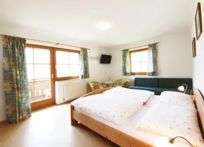 Ein Bett oder Betten in einem Zimmer der Unterkunft Landhaus Dorfer