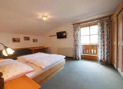 Ein Bett oder Betten in einem Zimmer der Unterkunft Landhaus Dorfer