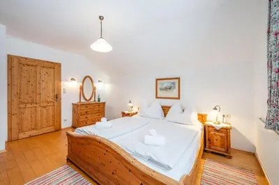 Ein Bett oder Betten in einem Zimmer der Unterkunft Stanglhof - by myNests