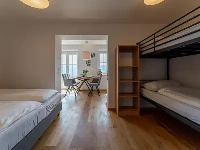 Ein Bett oder Betten in einem Zimmer der Unterkunft Lärchenhof Top 01