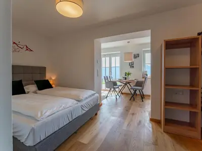Ein Bett oder Betten in einem Zimmer der Unterkunft Lärchenhof Top 01